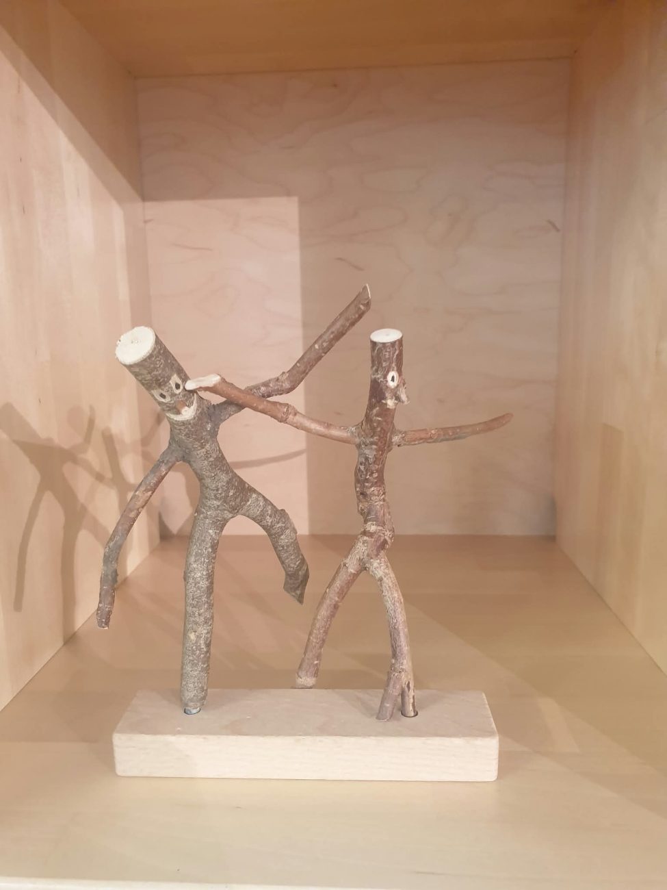 Wooden animals, figures and vehicles made by the children