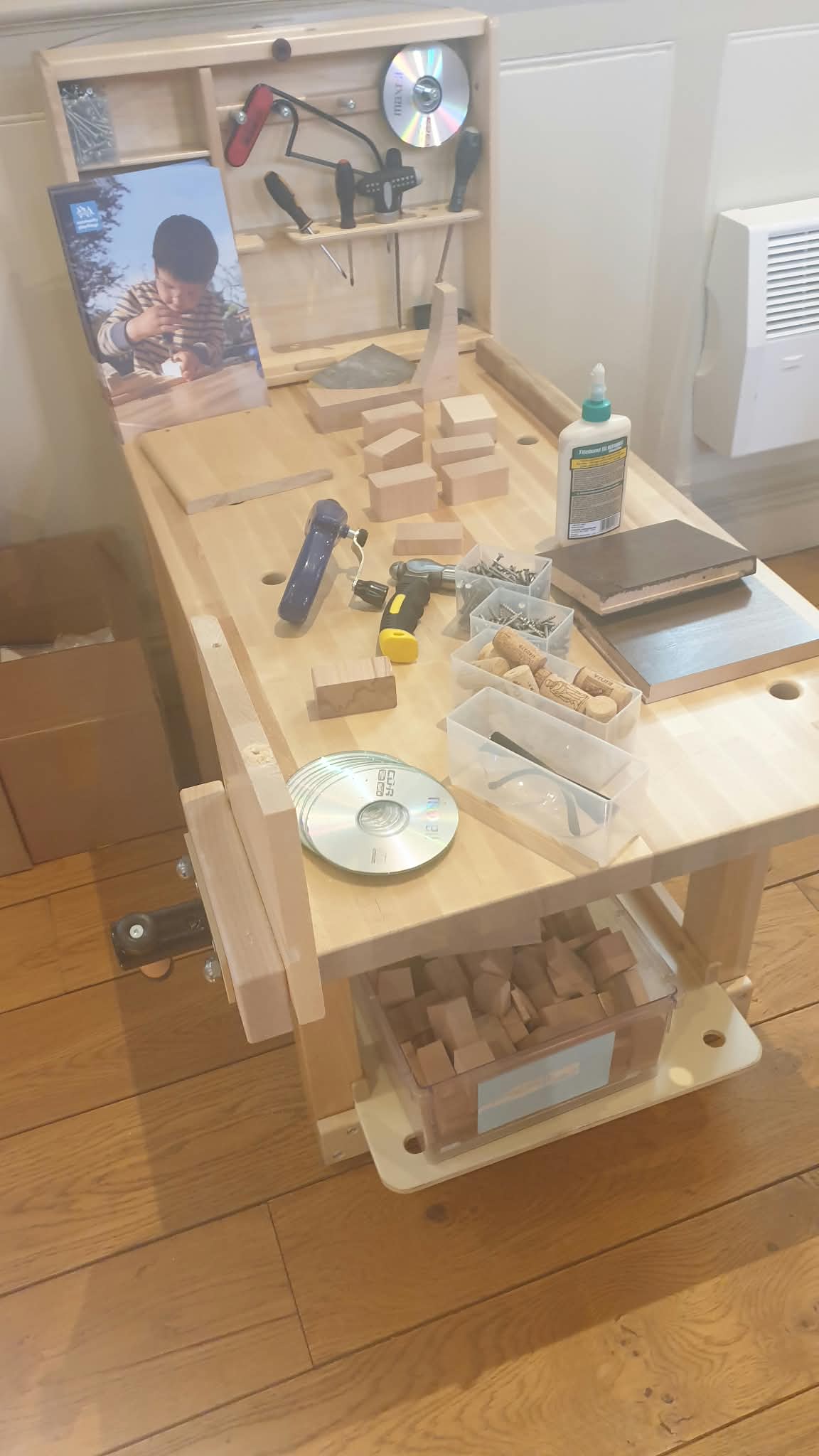 A child at the woodwork bench